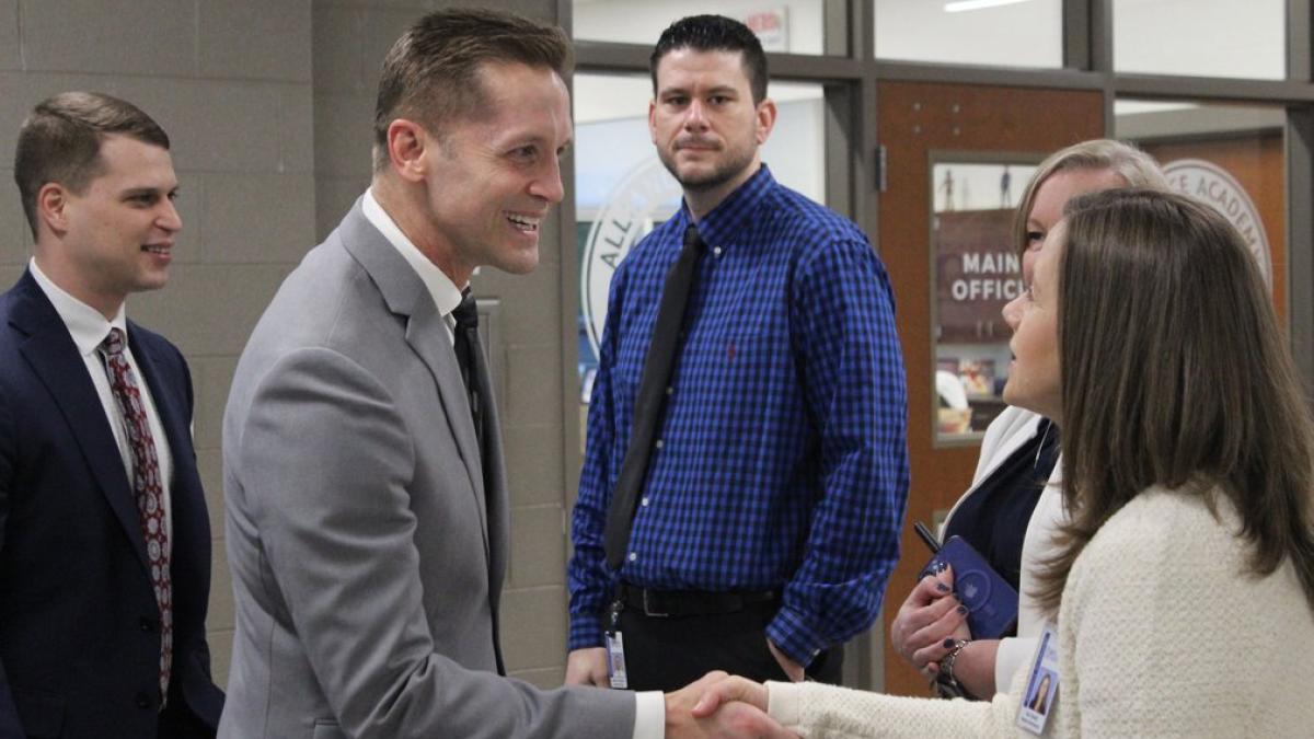 Rep. McCormick Shakes Hands at school