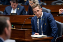 Rep. McCormick listens during a Congressional Hearing